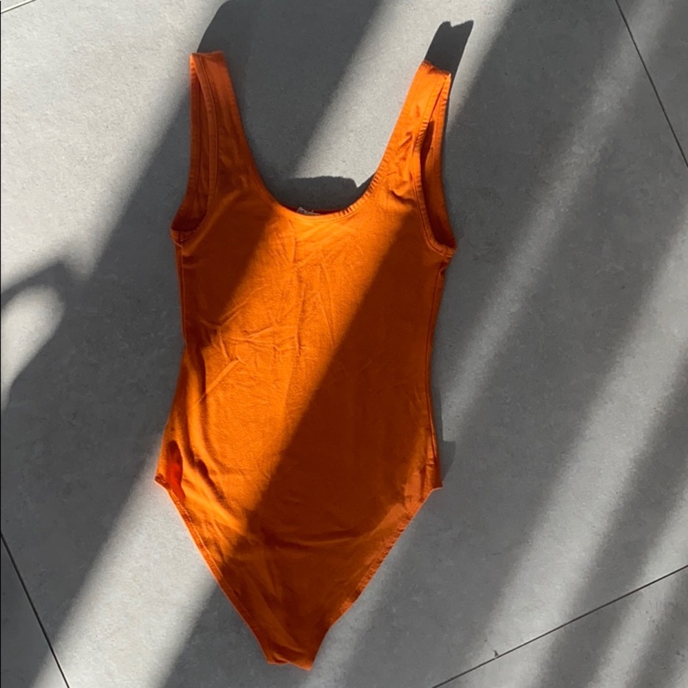 SLEEVELESS BODYSUIT